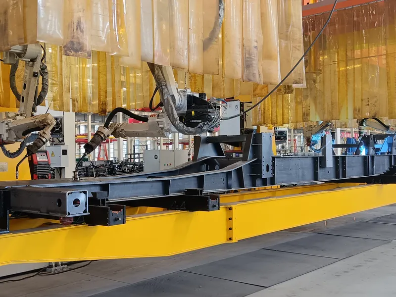 Welding robot on a trailer frame