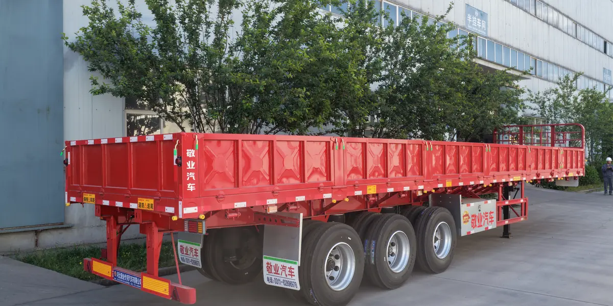 Dropside trailer with six side panels and a front headboard
