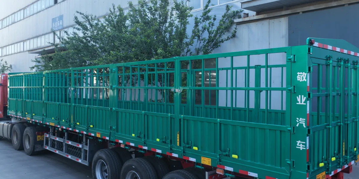 Row of fence semi trailers before delivery