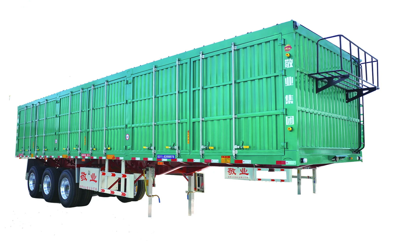 Full side view of a green Jingye semi trailer body with vertical ribs and three axles